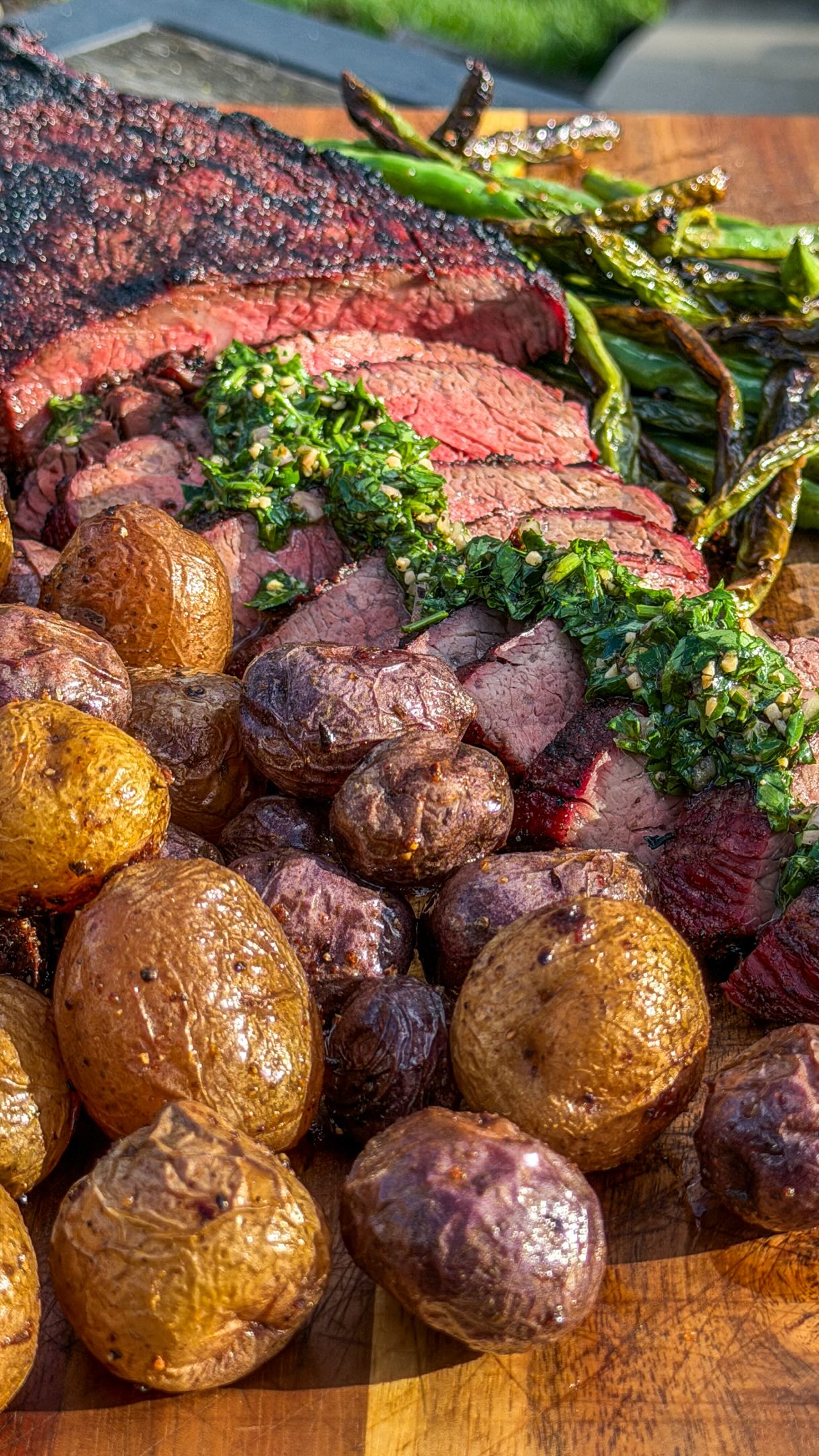 More than just dinner. More than just grilling.

Cooking over live fire is an experience. The crackle of the flames, the smell of smoke in the air, and the people gathered around waiting for that first slice. That’s what makes meals like this unforgettable.

Tonight’s centerpiece: a beautiful Snake River Farms American Wagyu tri-tip grilled over live fire for the perfect crust, sliced thin and topped with hand chopped chimichurri, served alongside roasted potatoes and blistered green beans.

These are the meals my family remembers long after the plates are cleared.

@SnakeRiverFarms American Wagyu just hits different over the fire.

#TheSRFexperience #TeeamSRF #AmericanWagyu #Beef #tritip
